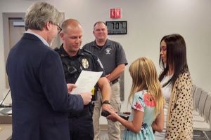 Sgt. Jay Henderson reaffirms his oath.