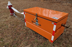 large orange metal hydrant meter box